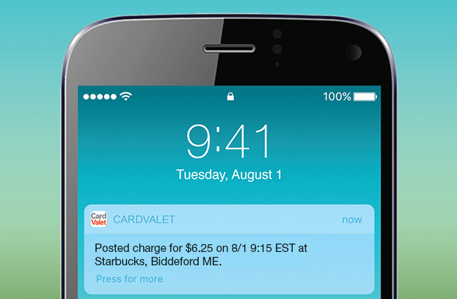 Smartphone displaying CardValet push notification after a debit card purchase